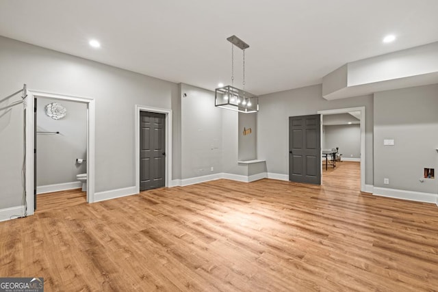 2230 Ewing Chapel Rd, Dacula, GA 30019 - unfurnished dining area with light wood-style flooring and recessed lighting