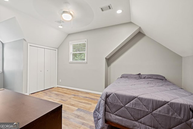 2230 Ewing Chapel Rd, Dacula, GA 30019 - bedroom featuring lofted ceiling, wood finished floors, a ceiling fan, recessed lighting, and a closet
