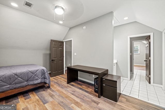 2230 Ewing Chapel Rd, Dacula, GA 30019 - bedroom with lofted ceiling, recessed lighting, and light wood finished floors