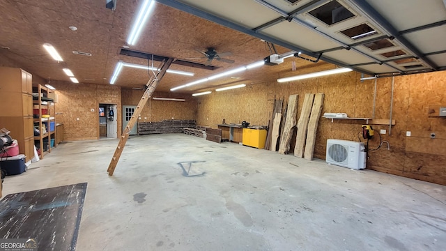 2230 Ewing Chapel Rd, Dacula, GA 30019 - garage with a workshop area and a garage door opener