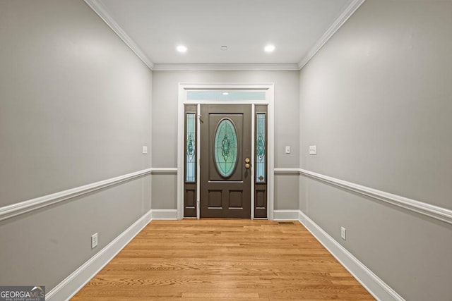 2230 Ewing Chapel Rd, Dacula, GA 30019 - foyer featuring ornamental molding, light wood-style flooring, and recessed lighting