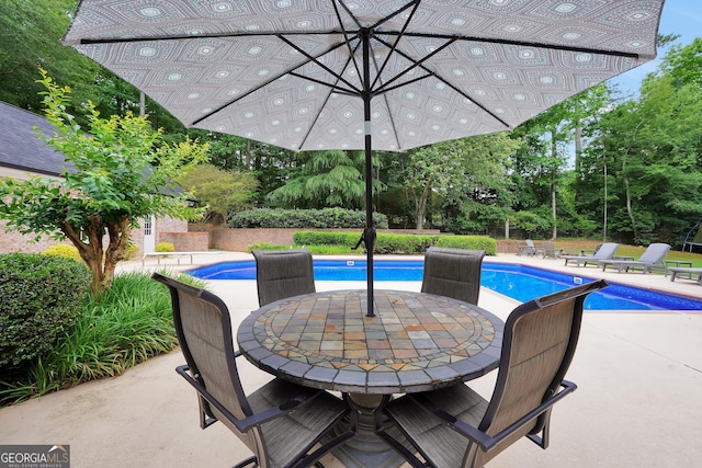 704 Branchview Ct, Mcdonough, GA 30252 - view of patio / terrace featuring view of scattered trees