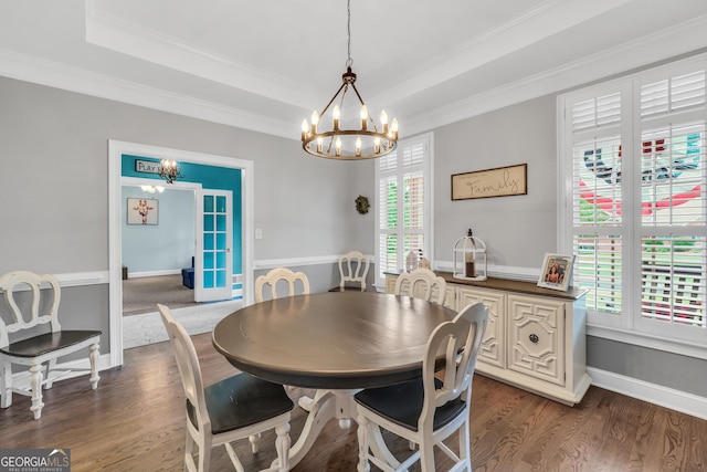 704 Branchview Ct, Mcdonough, GA 30252 - dining room with a chandelier, dark wood-style flooring, ornamental molding, french doors, and baseboards