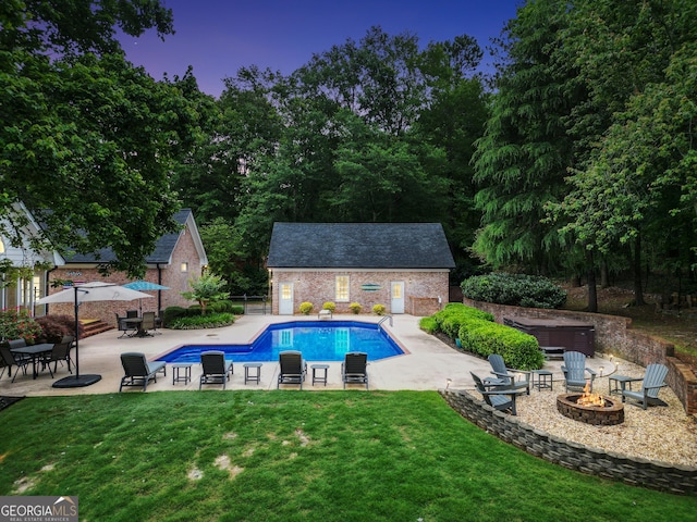 704 Branchview Ct, Mcdonough, GA 30252 - outdoor pool featuring an outdoor fire pit, a patio area, an outbuilding, and an exterior structure