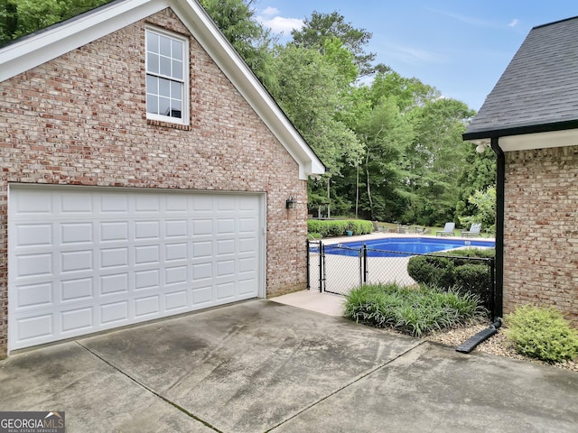 704 Branchview Ct, Mcdonough, GA 30252 - garage featuring concrete driveway