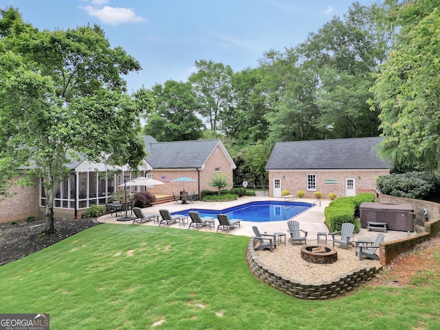 704 Branchview Ct, Mcdonough, GA 30252 - swimming pool featuring a hot tub, an outdoor fire pit, a patio, a lawn, and an outdoor structure