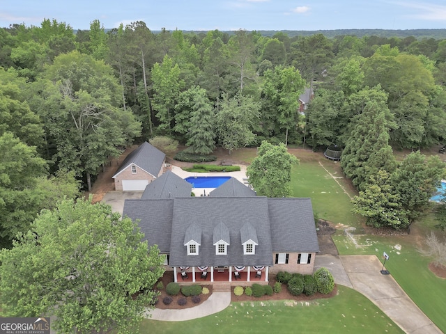 704 Branchview Ct, Mcdonough, GA 30252 - view from above of property with a forest