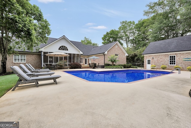 704 Branchview Ct, Mcdonough, GA 30252 - swimming pool featuring a patio area, a sunroom, and an outdoor structure