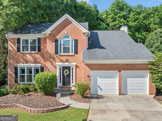 2346 Unicoi Ct, Duluth, GA 30097 - colonial house with a garage, a shingled roof, driveway, and a chimney
