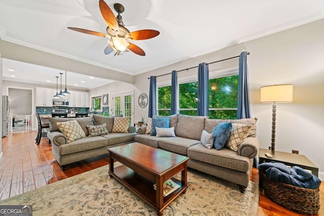 2346 Unicoi Ct, Duluth, GA 30097 - living area with light wood-type flooring, a ceiling fan, recessed lighting, and ornamental molding