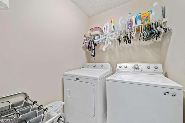 2346 Unicoi Ct, Duluth, GA 30097 - laundry area with washer and clothes dryer and a textured ceiling