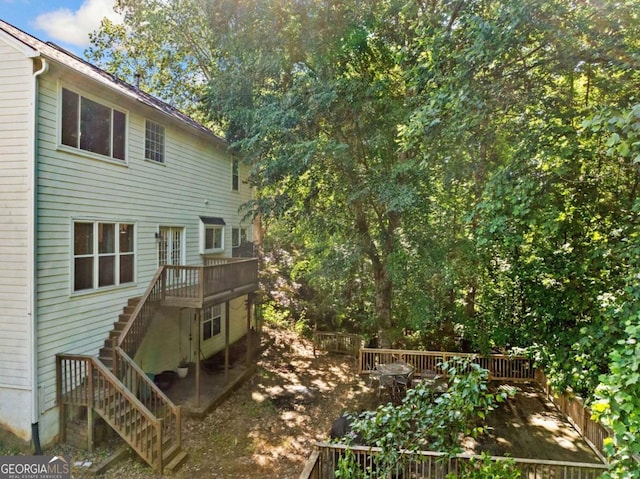 2346 Unicoi Ct, Duluth, GA 30097 - rear view of house with stairway and a deck