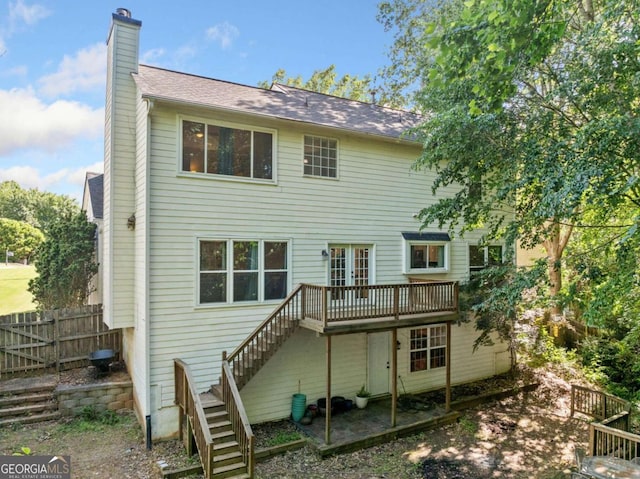 2346 Unicoi Ct, Duluth, GA 30097 - back of house featuring stairs, a chimney, and a deck