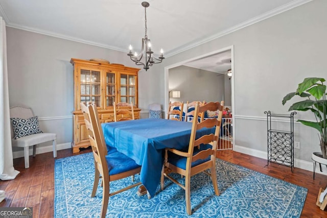 2346 Unicoi Ct, Duluth, GA 30097 - dining area featuring a chandelier, hardwood / wood-style flooring, ornamental molding, and baseboards