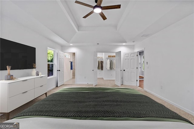 5 Windsor Ter, Avondale Estates, GA 30002 - unfurnished bedroom with a tray ceiling, light colored carpet, a spacious closet, recessed lighting, and a ceiling fan