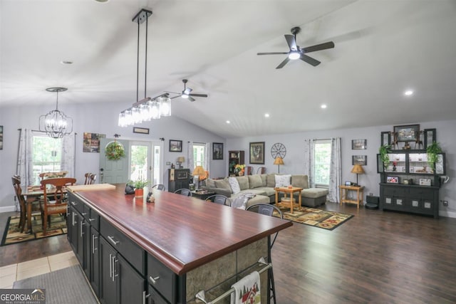287 Napier Dr, Eatonton, GA 31024 - kitchen with a ceiling fan, lofted ceiling, open floor plan, wood finished floors, and recessed lighting