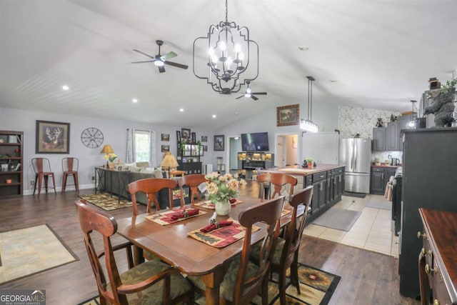 287 Napier Dr, Eatonton, GA 31024 - dining space featuring ceiling fan, lofted ceiling, light wood-style flooring, recessed lighting, and a chandelier