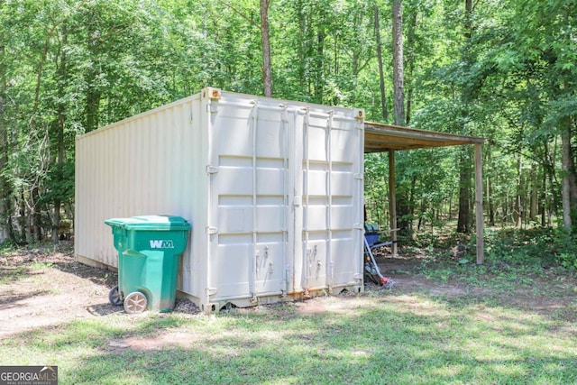 287 Napier Dr, Eatonton, GA 31024 - view of outdoor structure with a view of trees
