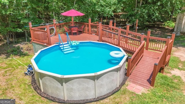 287 Napier Dr, Eatonton, GA 31024 - view of swimming pool featuring a wooden deck