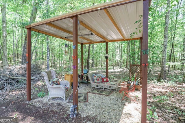 287 Napier Dr, Eatonton, GA 31024 - view of patio with a forest view