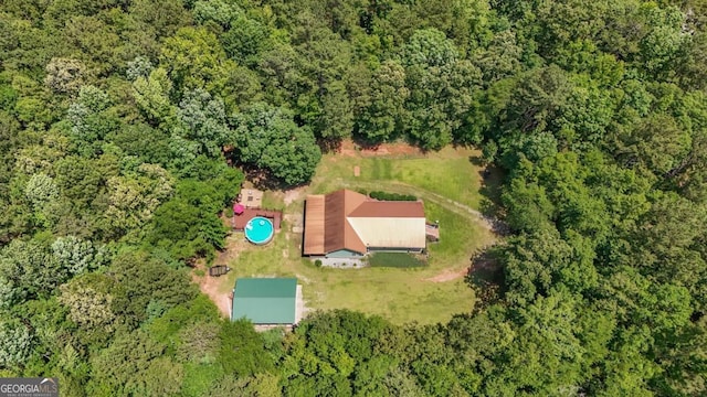 287 Napier Dr, Eatonton, GA 31024 - aerial view of property and surrounding area with a heavily wooded area