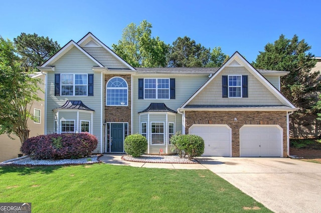 26 Ivey Meadow Dr, Dallas, GA 30132 - view of front facade with concrete driveway and a front yard