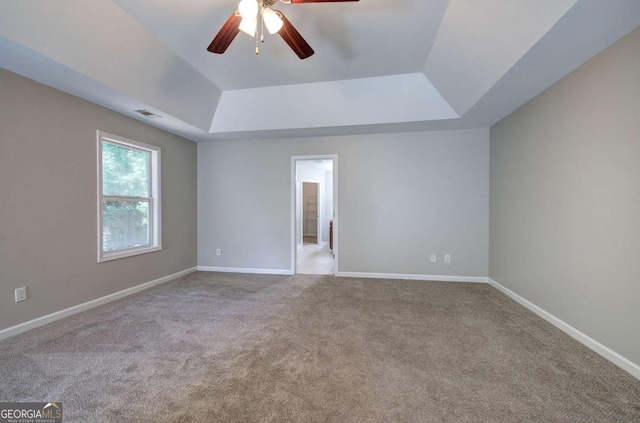 26 Ivey Meadow Dr, Dallas, GA 30132 - spare room with a raised ceiling, carpet flooring, ceiling fan, and baseboards
