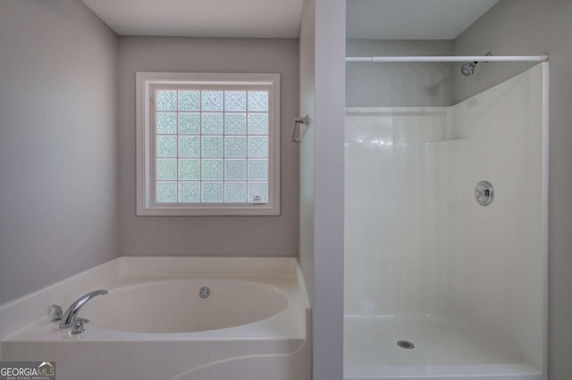 26 Ivey Meadow Dr, Dallas, GA 30132 - bathroom featuring a garden tub and a shower