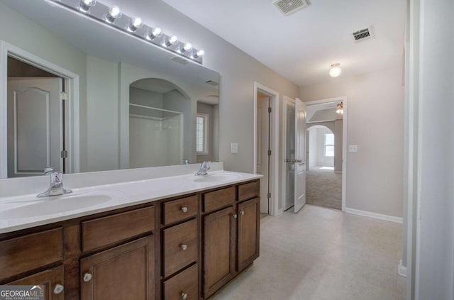 26 Ivey Meadow Dr, Dallas, GA 30132 - full bath featuring double vanity and baseboards