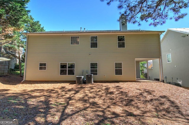 26 Ivey Meadow Dr, Dallas, GA 30132 - back of property featuring a chimney
