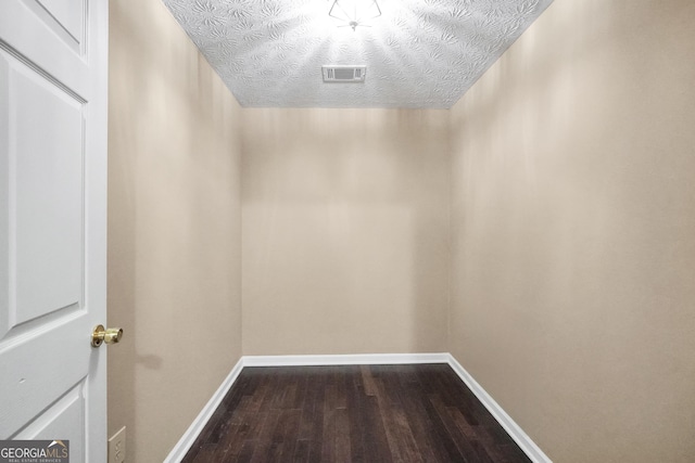 130 Nicki Ct, Hampton, GA 30228 - interior space featuring wood finished floors, baseboards, and a textured ceiling