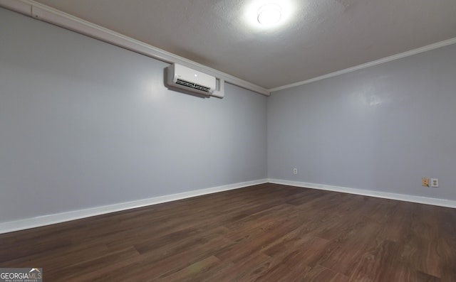 712 Boy Scout Rd, Newnan, GA 30263 - unfurnished room featuring ornamental molding, dark wood finished floors, a wall mounted AC, and baseboards