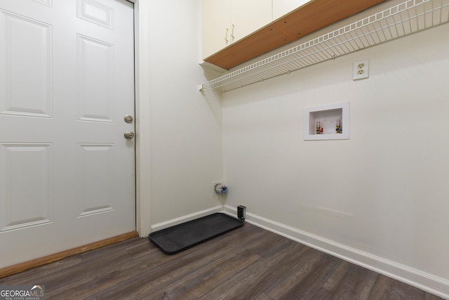 712 Boy Scout Rd, Newnan, GA 30263 - washroom with cabinet space, baseboards, and dark wood-style floors