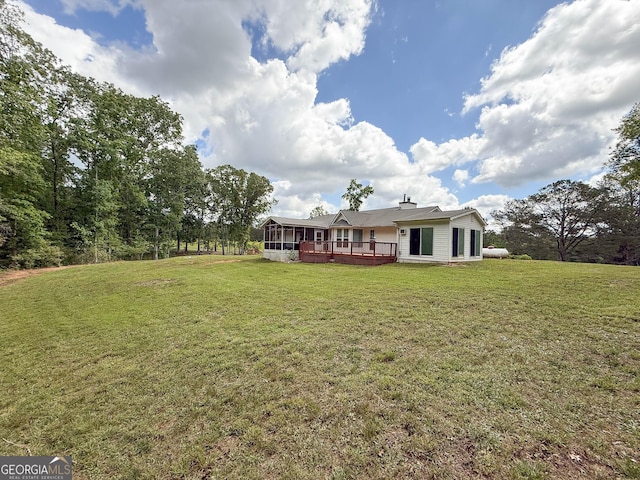 712 Boy Scout Rd, Newnan, GA 30263 - view of green lawn with a deck