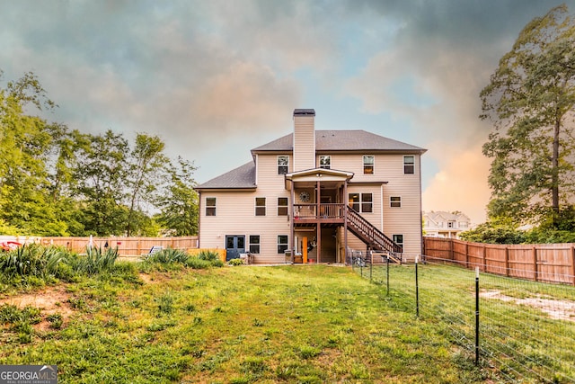 632 Creekside Trce, Covington, GA 30014 - rear view of property featuring stairway, a chimney, a wooden deck, and a shingled roof