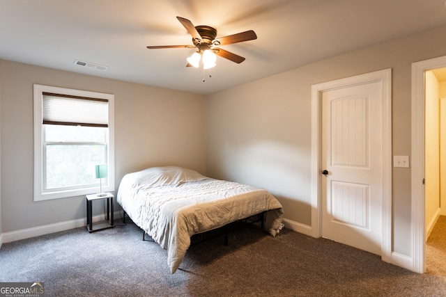 632 Creekside Trce, Covington, GA 30014 - carpeted bedroom with baseboards and a ceiling fan