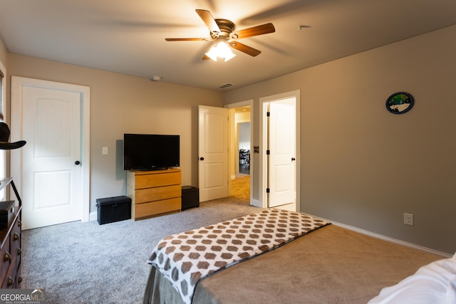 632 Creekside Trce, Covington, GA 30014 - carpeted bedroom with baseboards and a ceiling fan