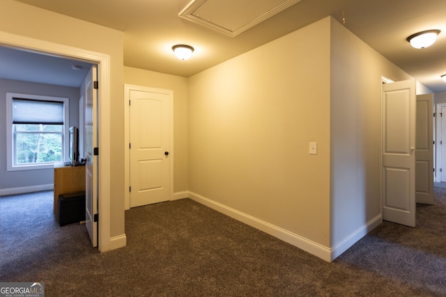 632 Creekside Trce, Covington, GA 30014 - hallway featuring carpet floors, baseboards, and attic access