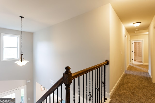 632 Creekside Trce, Covington, GA 30014 - corridor featuring an upstairs landing, carpet flooring, healthy amount of natural light, and baseboards