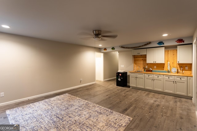 632 Creekside Trce, Covington, GA 30014 - kitchen featuring recessed lighting, wood finished floors, baseboards, and ceiling fan