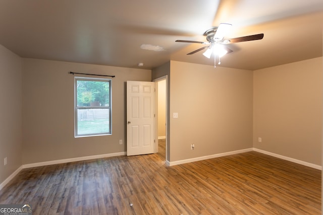 632 Creekside Trce, Covington, GA 30014 - spare room featuring ceiling fan, wood finished floors, and baseboards