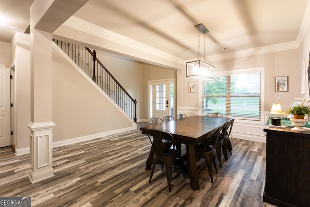 632 Creekside Trce, Covington, GA 30014 - dining room featuring dark wood-style flooring, stairs, crown molding, and wainscoting