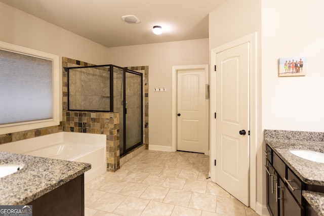 632 Creekside Trce, Covington, GA 30014 - bathroom featuring a stall shower, a bath, and vanity