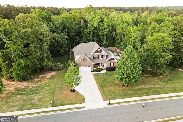 632 Creekside Trce, Covington, GA 30014 - view of subject property featuring a heavily wooded area