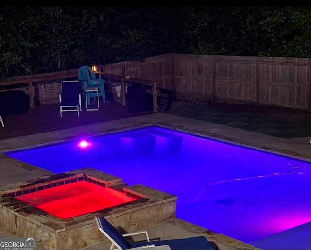 632 Creekside Trce, Covington, GA 30014 - view of swimming pool featuring a fenced backyard and a pool with connected hot tub