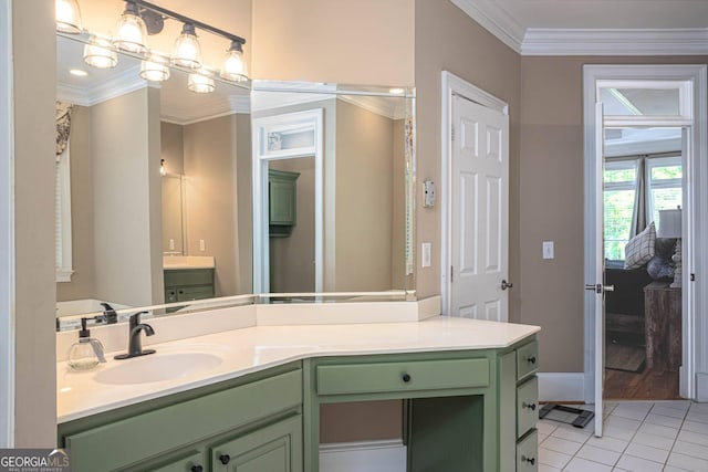 395 Grove Ridge Dr, Loganville, GA 30052 - bathroom featuring tile patterned floors, vanity, crown molding, and baseboards