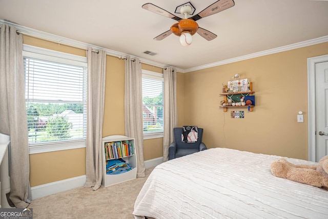 395 Grove Ridge Dr, Loganville, GA 30052 - carpeted bedroom featuring baseboards, ornamental molding, and ceiling fan