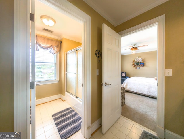 395 Grove Ridge Dr, Loganville, GA 30052 - bathroom featuring tile patterned floors, ensuite bathroom, crown molding, baseboards, and enclosed tub / shower combo
