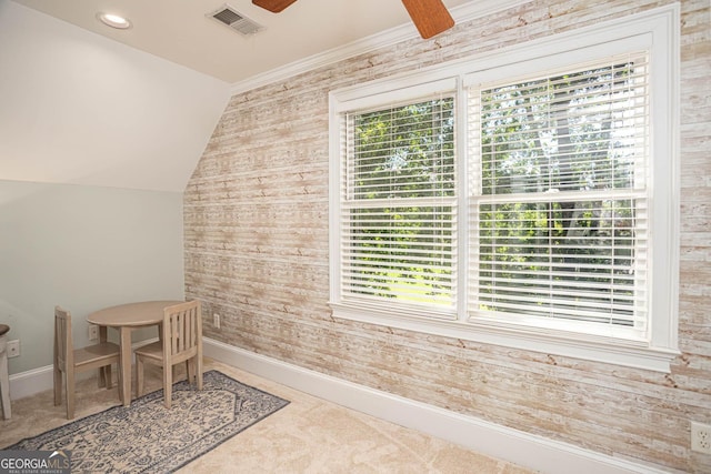395 Grove Ridge Dr, Loganville, GA 30052 - bathroom featuring ceiling fan, wooden walls, and vaulted ceiling