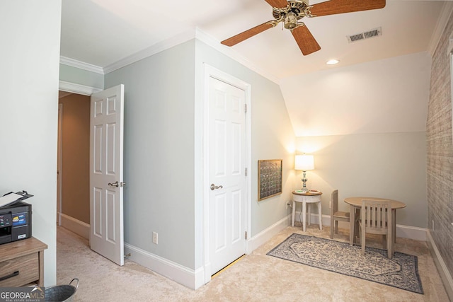 395 Grove Ridge Dr, Loganville, GA 30052 - living area featuring a ceiling fan, carpet floors, crown molding, baseboards, and lofted ceiling